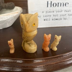 Grouping of hand carved owls out of marble.  The tallest 2” the small are 1”